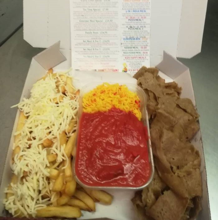 Big Chef Box meal with cheesy chips, doner meat and curry sauce served with rice.